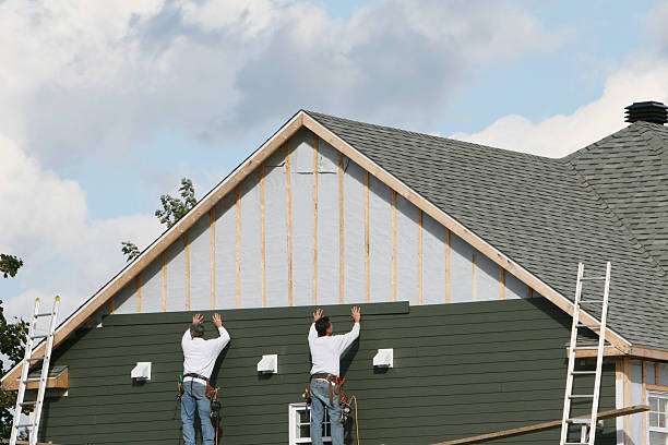 Professional Storm Damage Siding Repair technician working in Granville, WV
